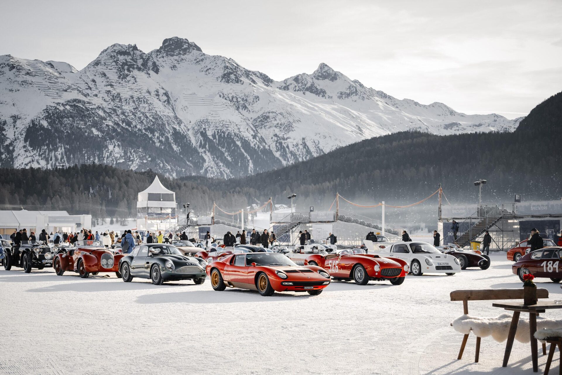 Alpine setting and cars on ice at St. Moritz